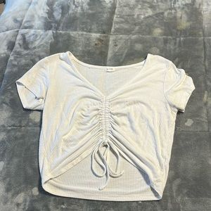 White short sleeve crop top with tie in the middle